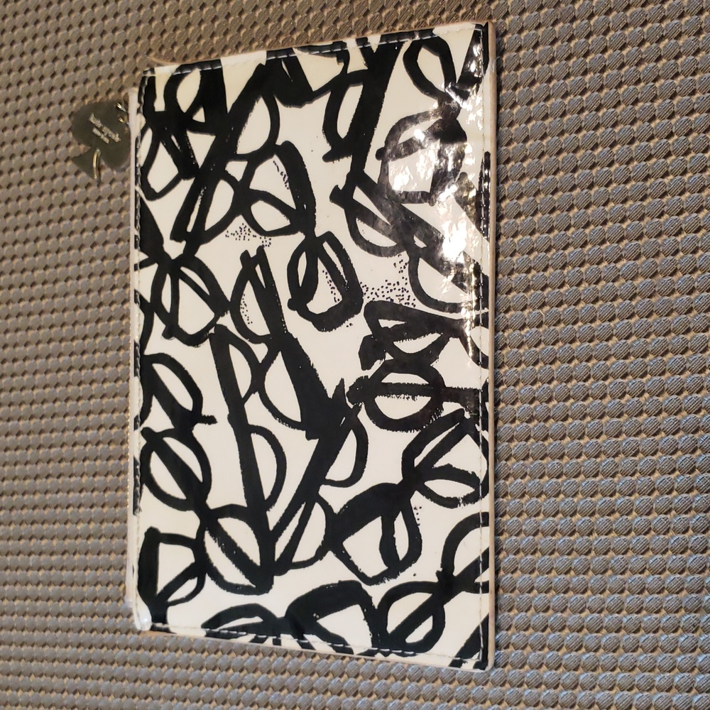 kate spade Black and Cream Cosmetic Bags with Artistic Design